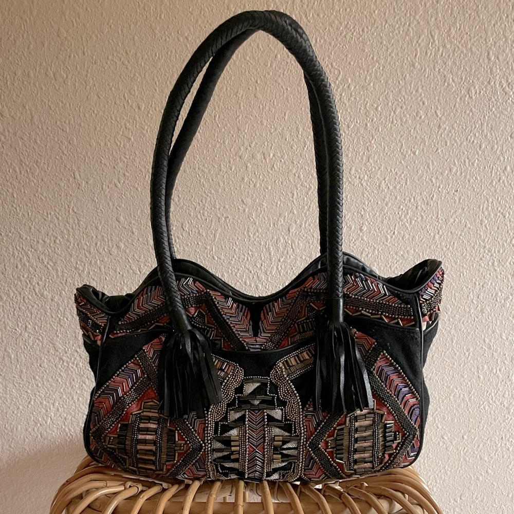 Unique beaded and embroidered Antik Batik bag with black leather tassels